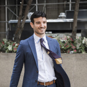 cheerful-businessman-with-waving-tie